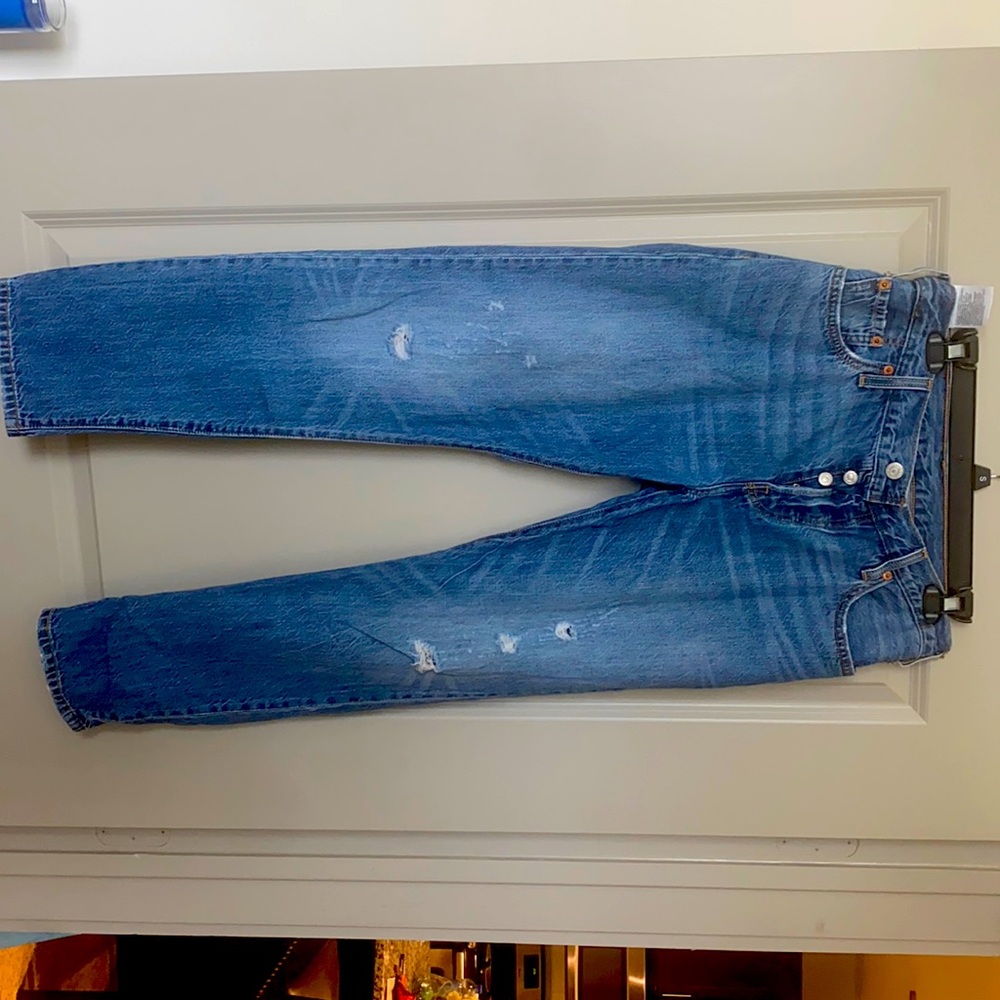 Levi boyfriend jeans with rips in it